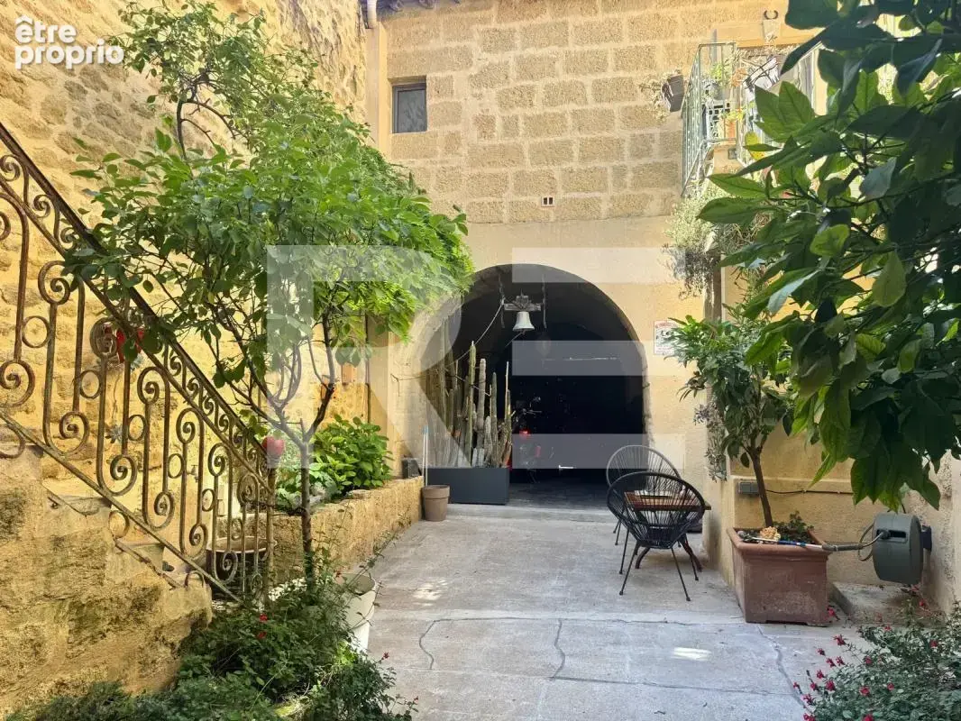 Belle maison de village avec patio, jardin, garage et T2 - photo 2