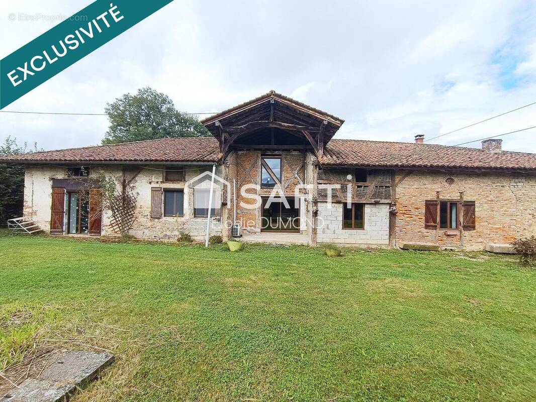 Photo 1 - Maison à SAINT-ETIENNE-DU-BOIS