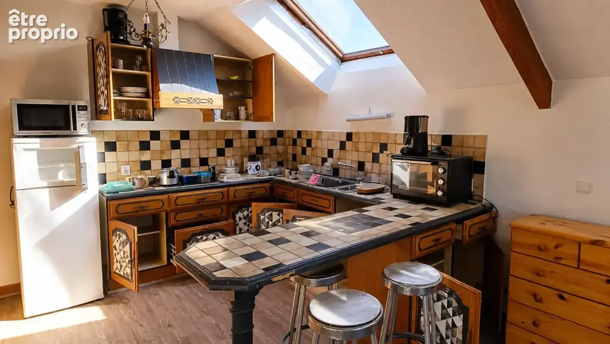 Maison de 8 pièces de 180 m² divisée en 4 appartements - photo 5