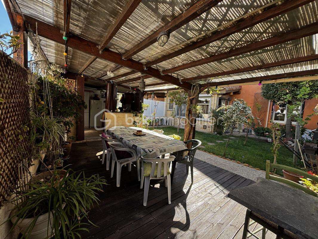 Maison 4 chambres avec jardin arboré, terrasse couverte et garage - photo 8