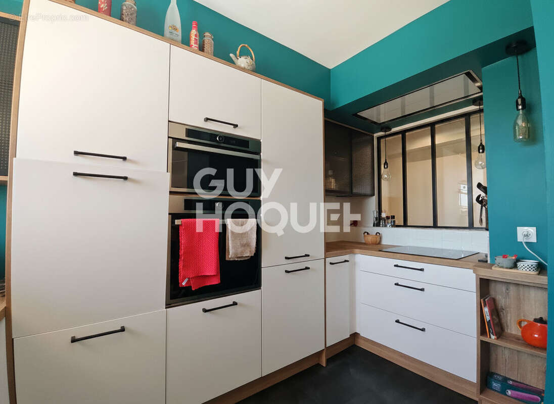 Magnifique T4 de 87m² avec terrasse de 80m² - Proximité Centre-ville - Résidence sécurisée avec ascenseur et garage ! - photo 8