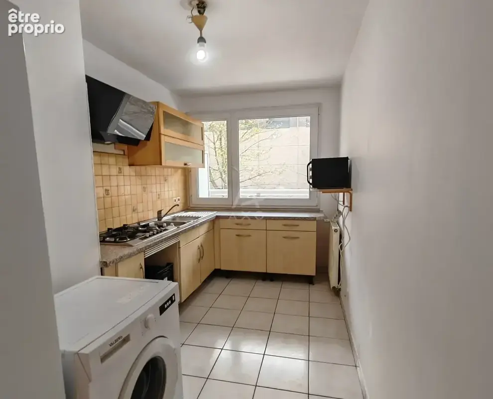 Appartement F5 au 1er étage 4 chambres 2 parkings - photo 6