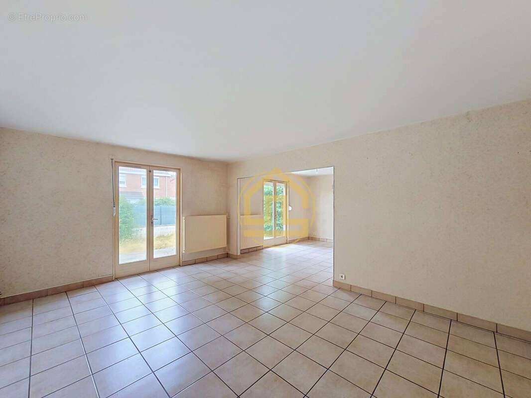 Maison 101 m² à Louvroil  - photo 4