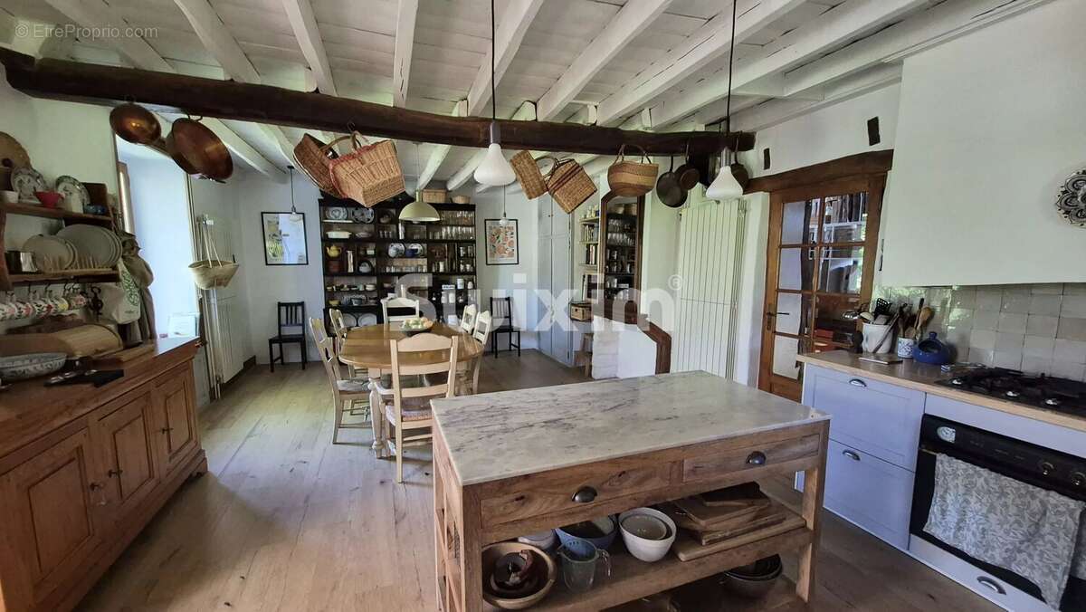 Deux Maisons de caractère réunies par une véranda de 60 m² - photo 6