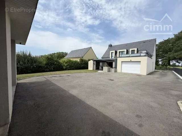 Maison 160 m² avec double garage de 100 m² - photo 2