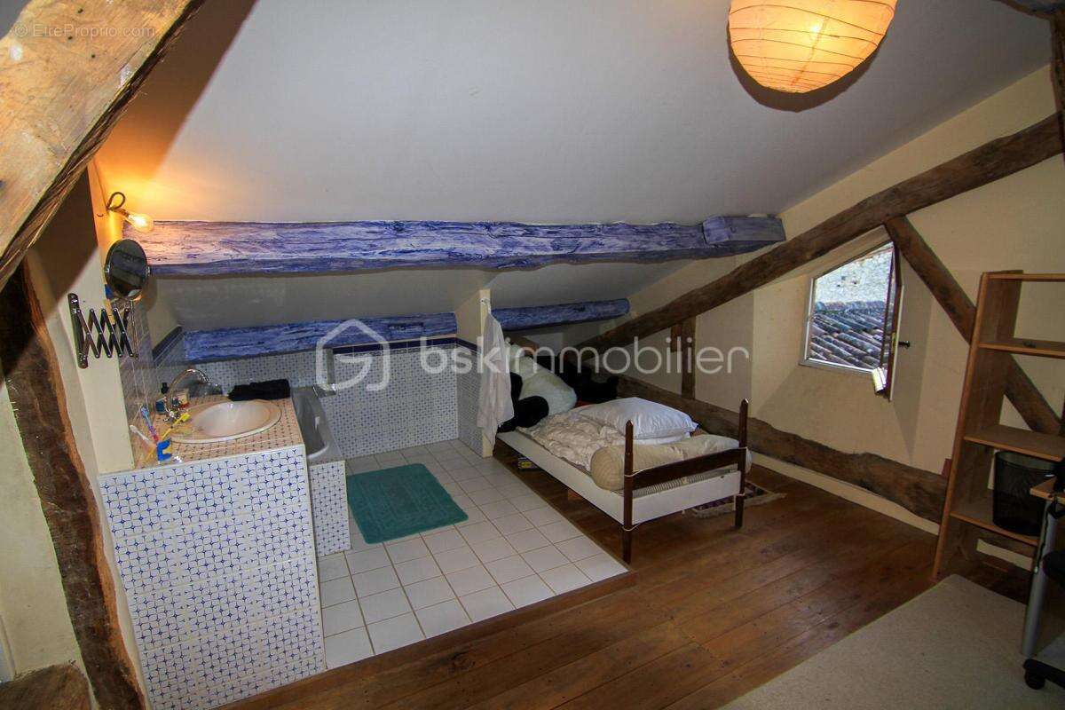 Au cœur de Saint-Clar, un immeuble aux volumes généreux et au fort potentiel - photo 23