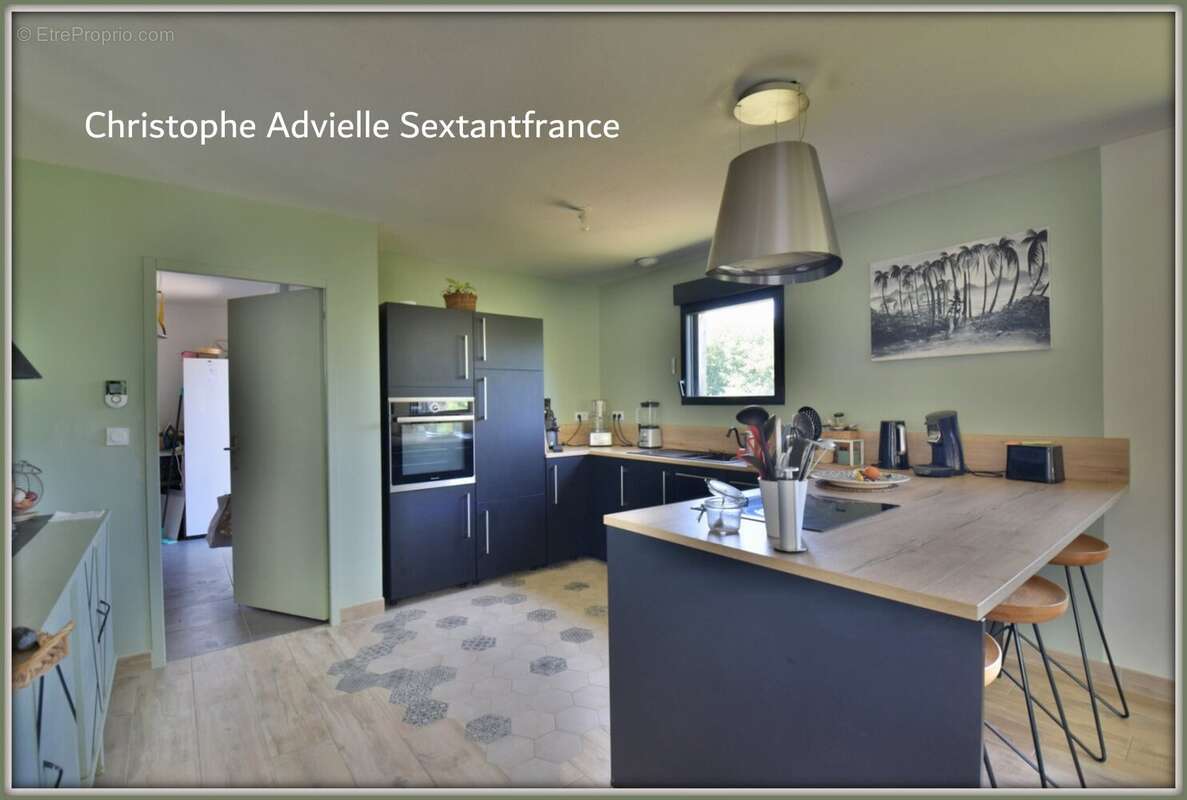 Maison ossature bois RT 2012, plain pied , 4 chambres, terrain de 6177 M2 en fond d'impasse avec belle vue - photo 4