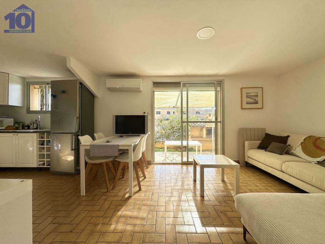 Appartement en rez-de-jardin - photo 3
