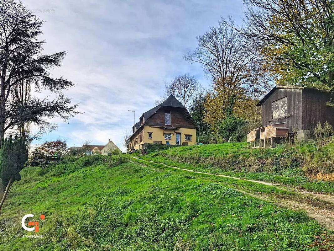 Maison à SAINT-OUEN-DE-THOUBERVILLE