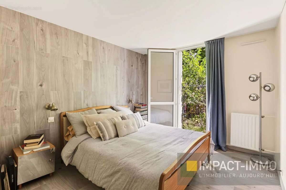 Puteaux – rez de jardin 3 pièces de 68 m² + jardin + terrasse + parking - photo 4