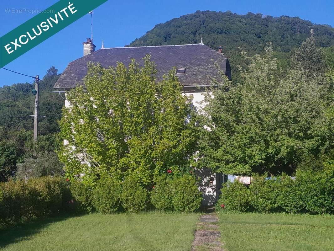 Photo 2 - Maison à VIC-SUR-CERE