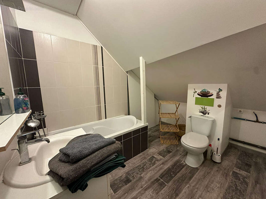 Appartement en duplex 5 pièces 127m² hypercentre Provins - photo 8