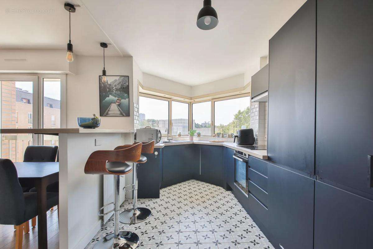 Appartement de 3 pièces de 70,5 m² à Cachan vendu loué meublé - photo 7