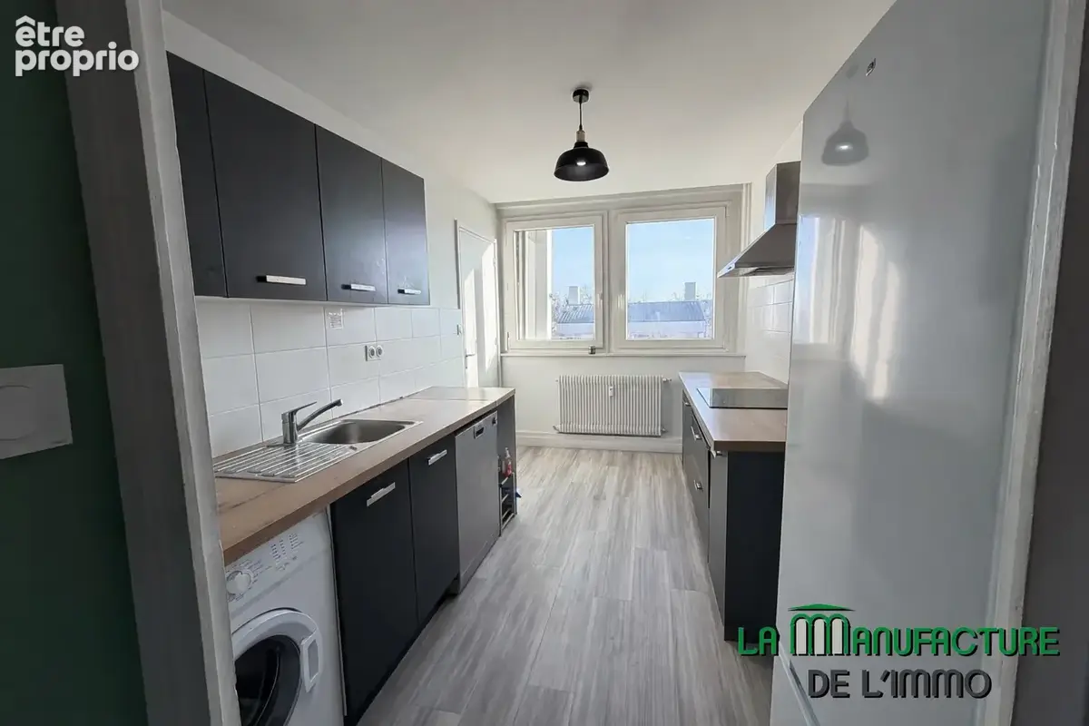 Appartement t4- 89,52m2 - cave - rue marengo - saint-etienne. - photo 3