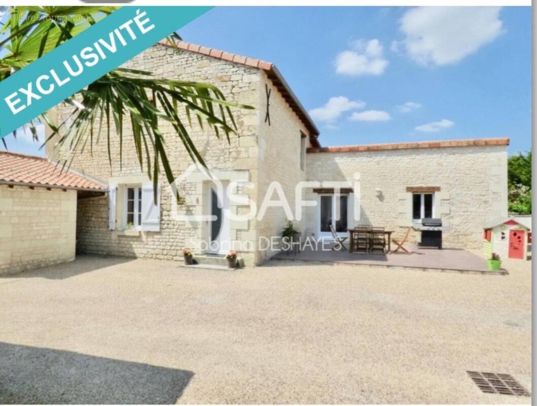 Photo 1 - Maison à LES TROIS-MOUTIERS