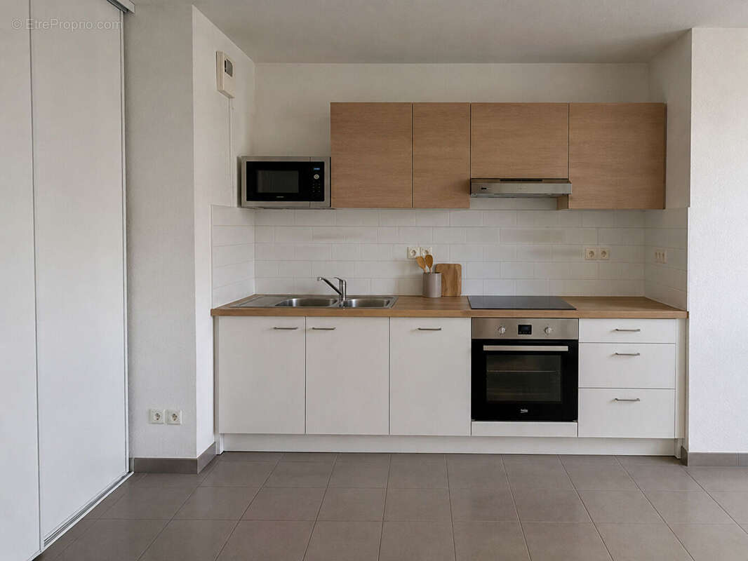 Appartement t3 - terrasse & parking - photo 5