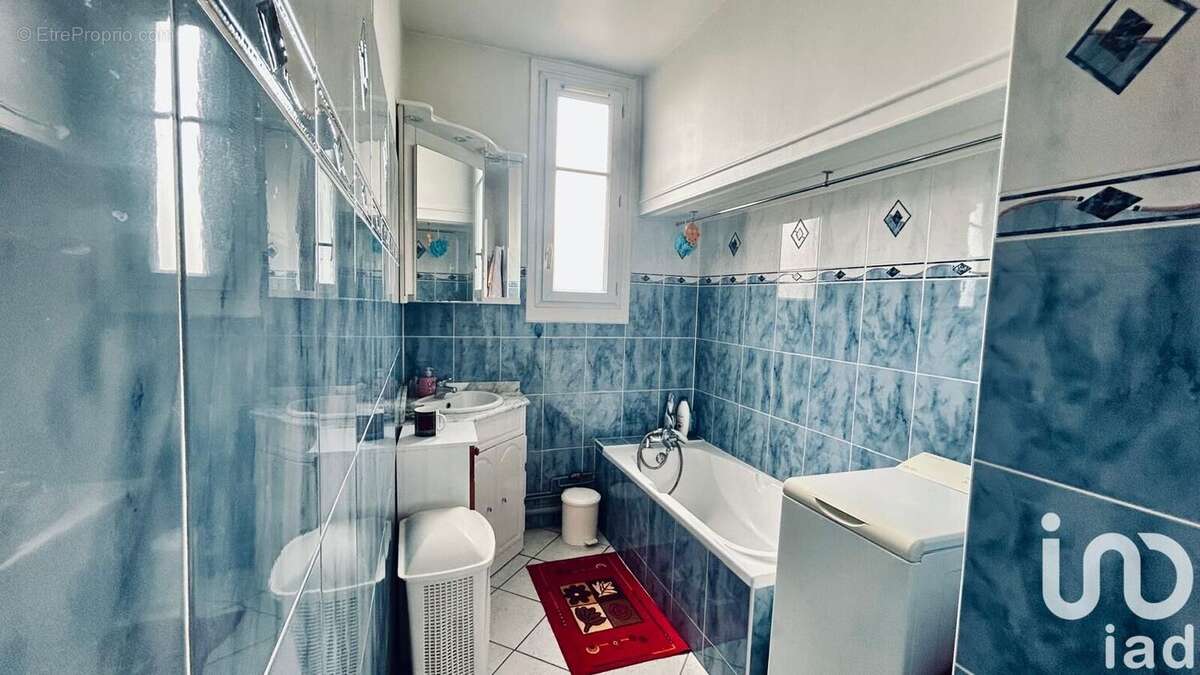 Photo 9 - Appartement à COURBEVOIE