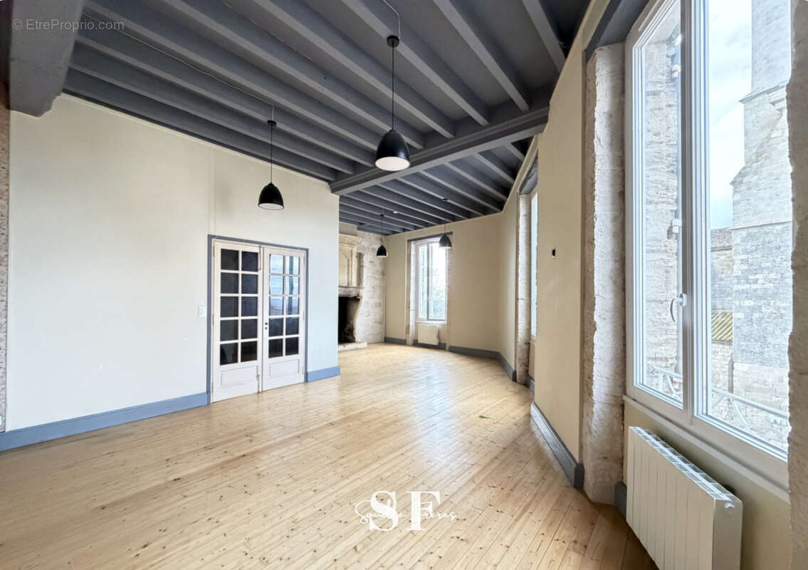 Rive gauche, immeuble de caractere appartement et local commercial - photo 6