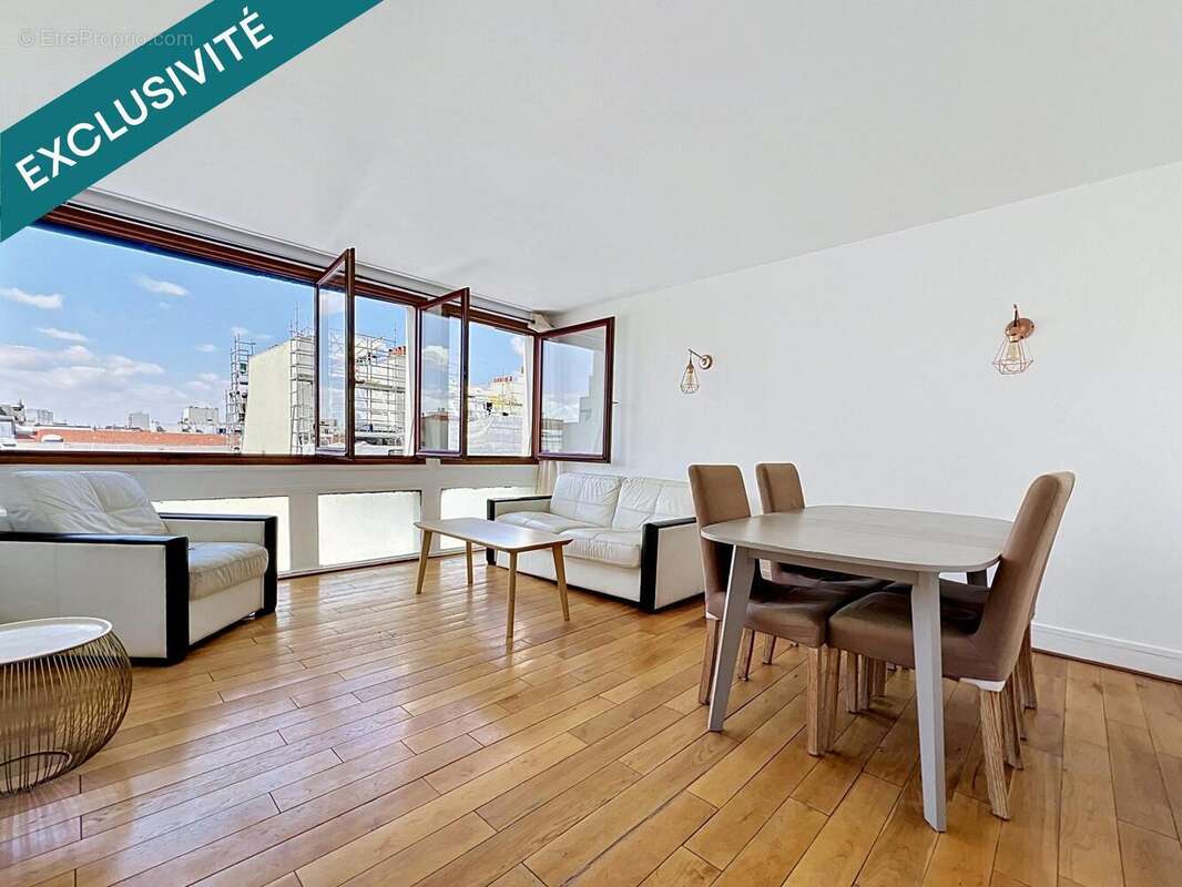 Photo 2 - Appartement à PARIS-19E