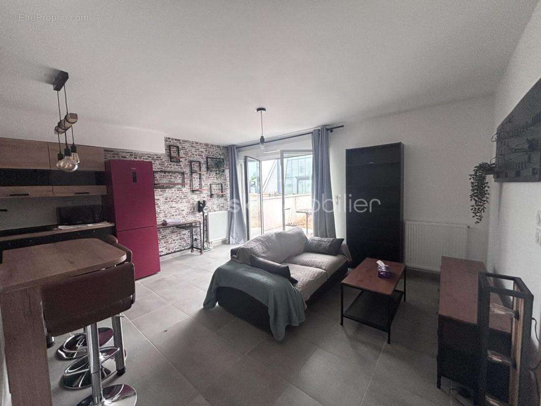 Appartement T2 en ré de jardin au pied du tramway avec stationnement - photo 3