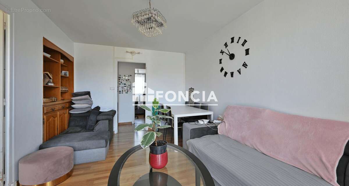 À vendre – Appartement T2 traversant de 52 m² avec terrasse, garage, cave et locataire en place - photo 4