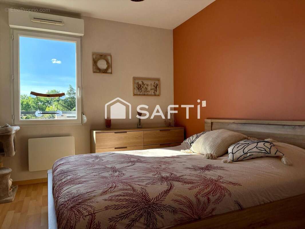 Photo 3 - Appartement à PAREMPUYRE