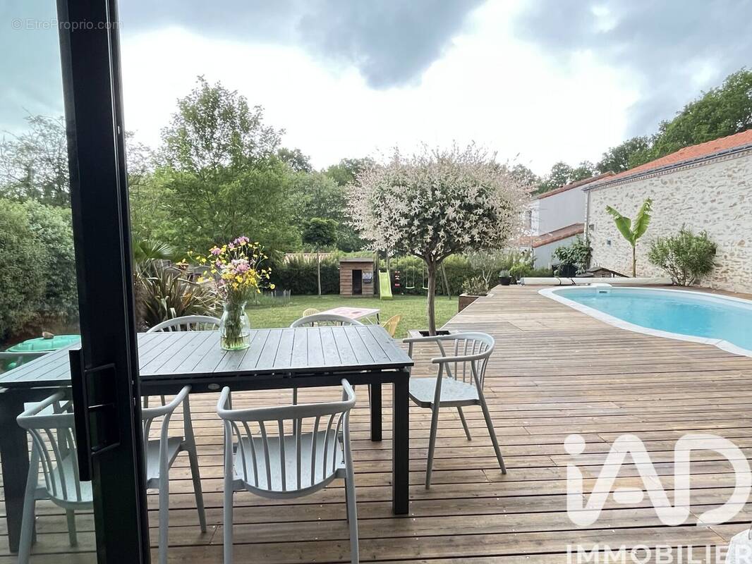 Photo 1 - Maison à BOUGUENAIS