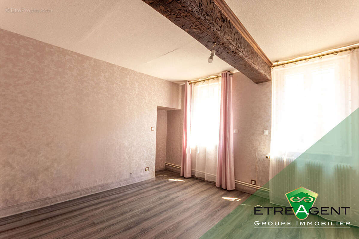 Maison DAMVILLE CENTRE-VILLE - 142 m² - 3 chambres - photo 9