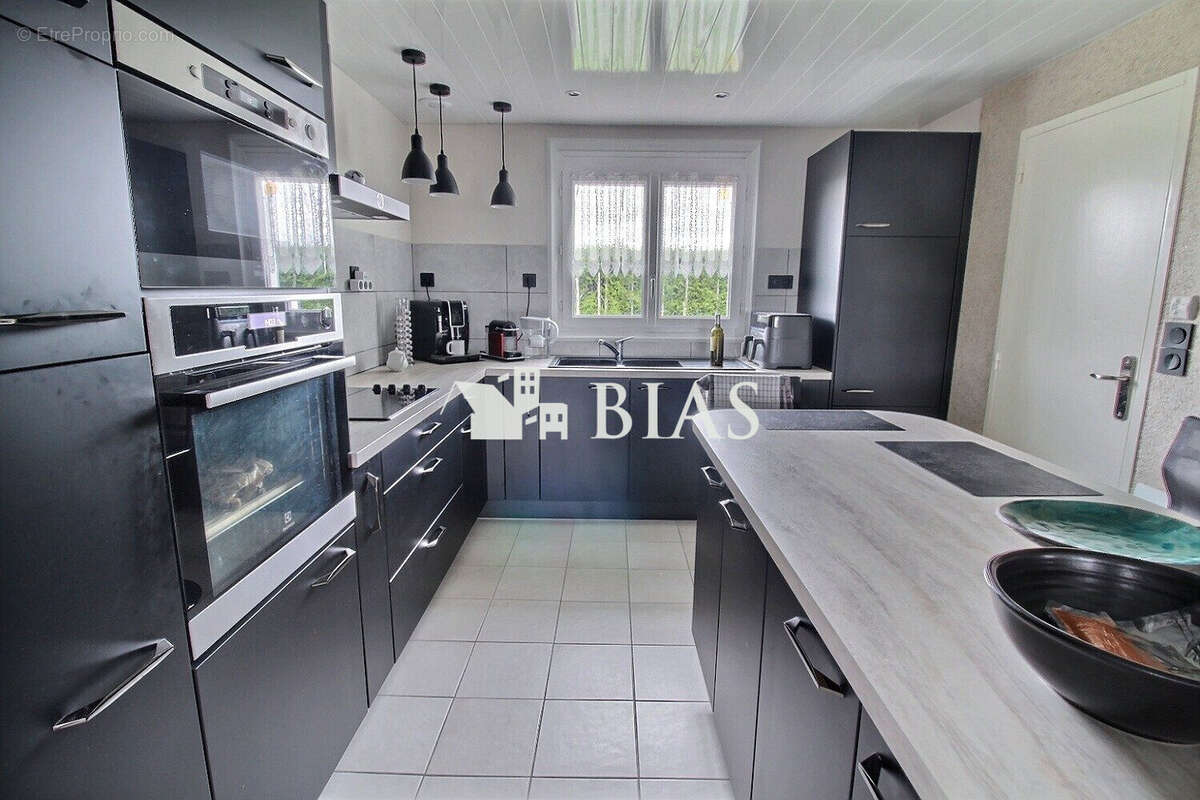 Maison à BOURG-ACHARD