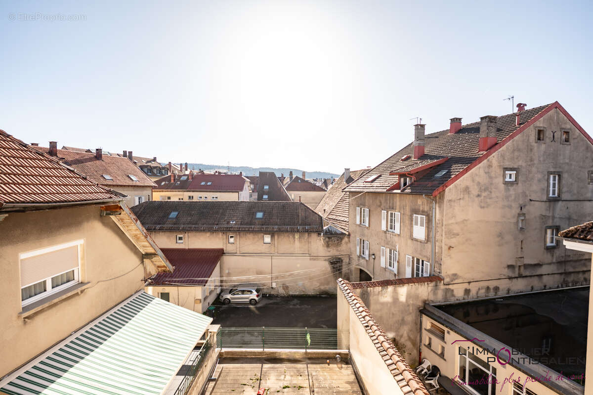 Pontarlier - centre ville : appartement de type 4 avec cave et garage - photo 14
