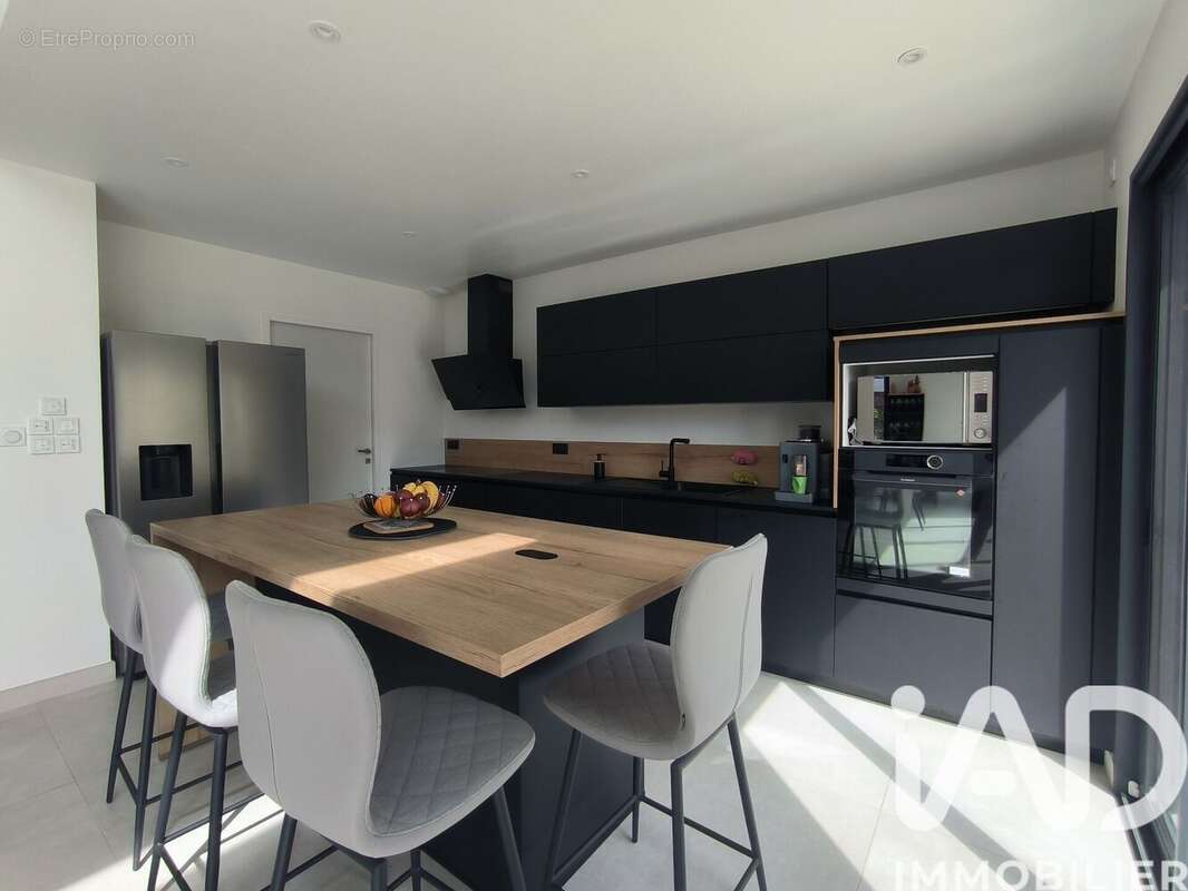 Maison 138 m² à Bouguenais  - photo 5