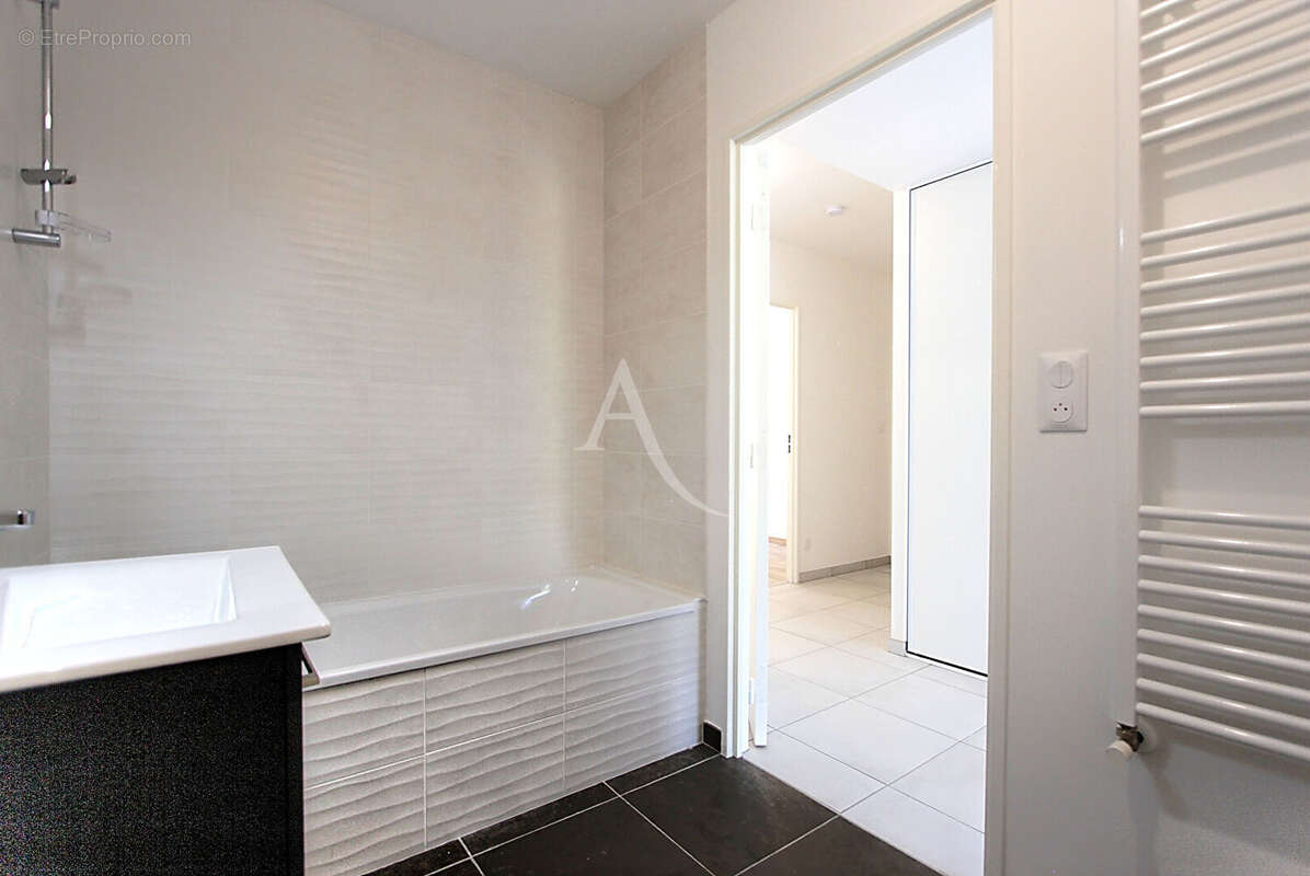 Appartement  3 pièces Rez-de-jardin avec terrasse, parking et accès PMR - photo 9