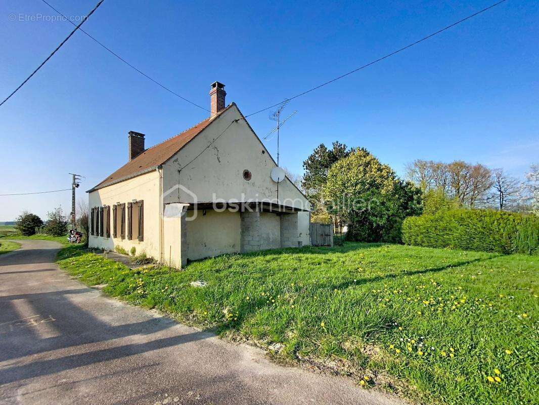 Maison à DOUCHY