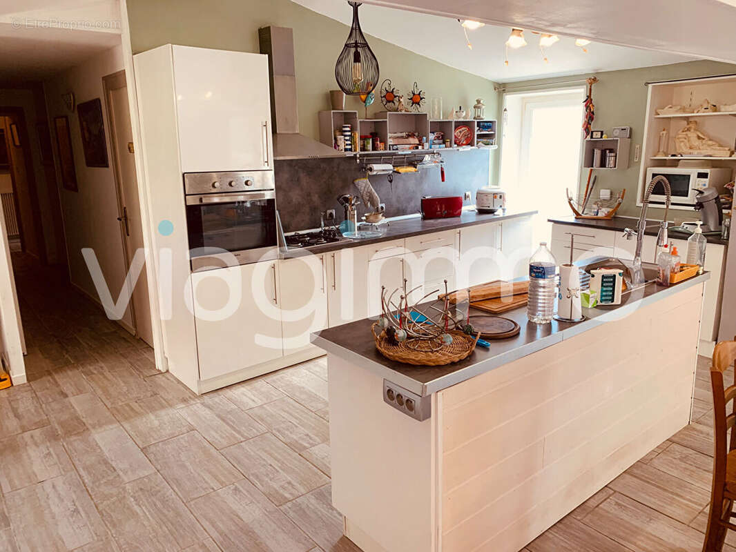 Maison Vouillé Les Marais 4 pièce(s) 105 m2 - photo 3