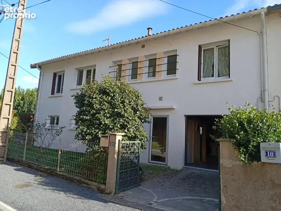 Maison mitoyenne de 85m² avec jardin et sous-sol - photo 1