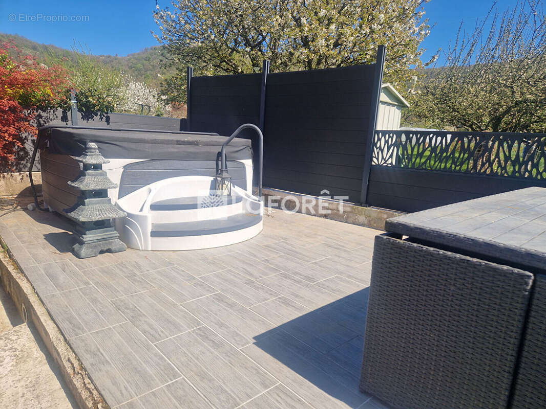 Maison Mitoyenne en pierre à Mesnay 8 pièce(s) 212 m2 - photo 6