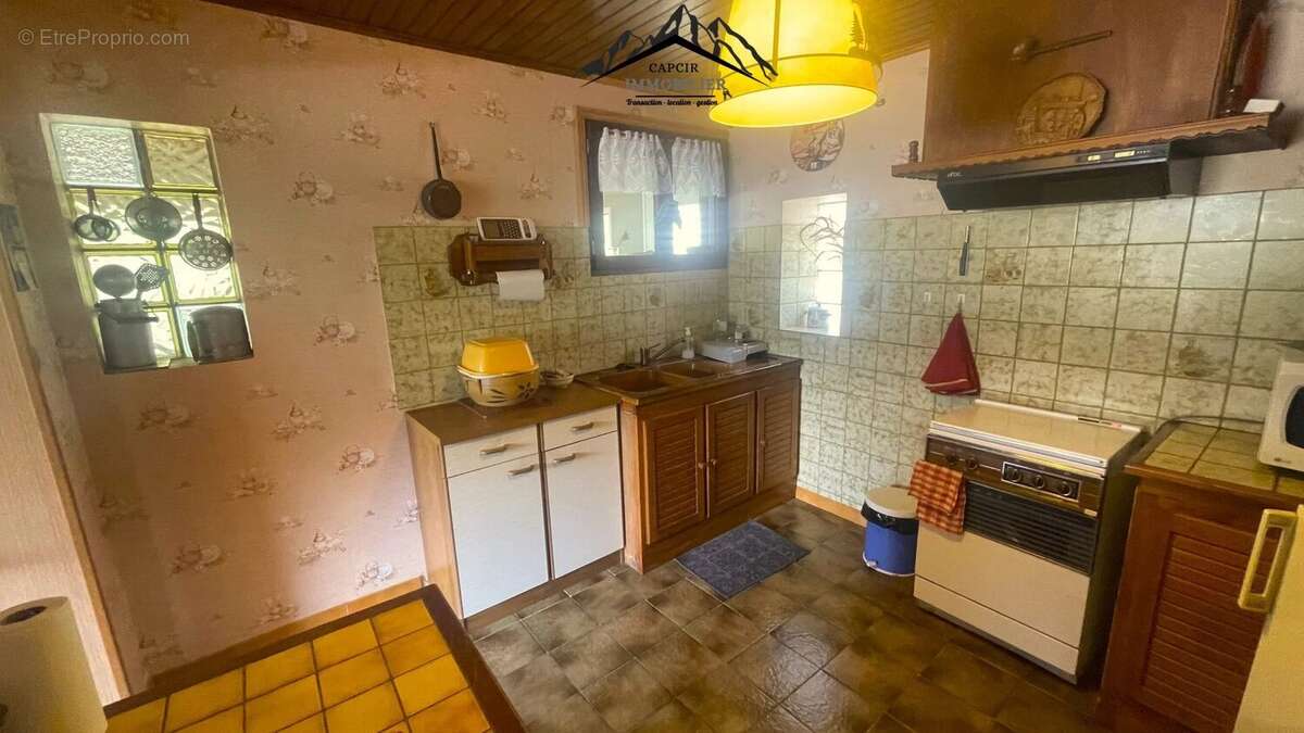 Maison 4 faces en pierre avec jardin - AYGUATÉBIA-TALAU - photo 32