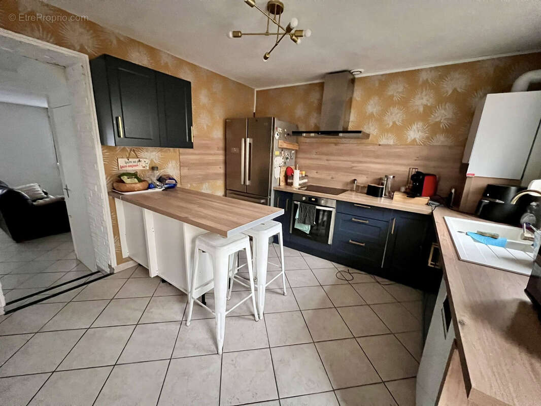 Maison à BRUAY-LA-BUISSIERE