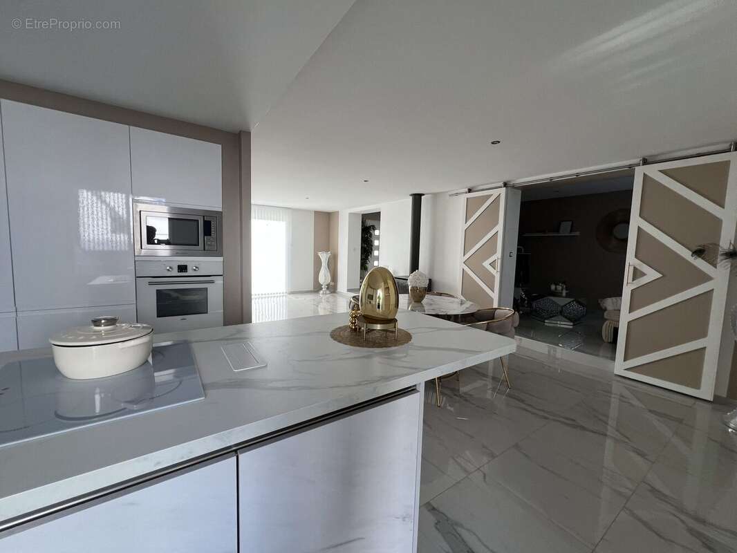 Maison 140 m² à Saint-Lambert-La-Potherie  - photo 7