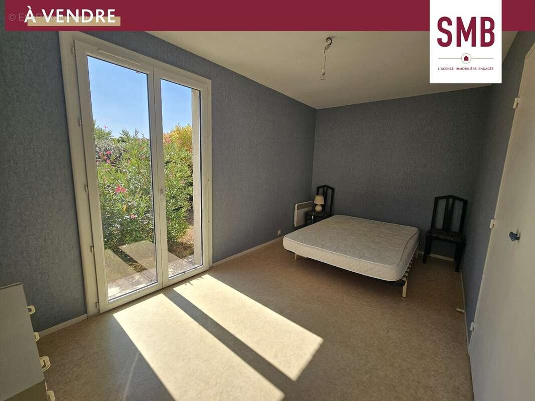 Maison mitoyenne de plain-pied à Lons - photo 7