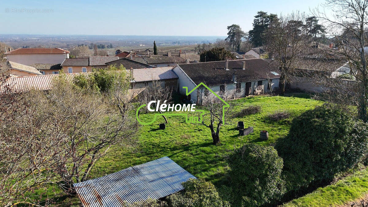 Maison à ROMANECHE-THORINS