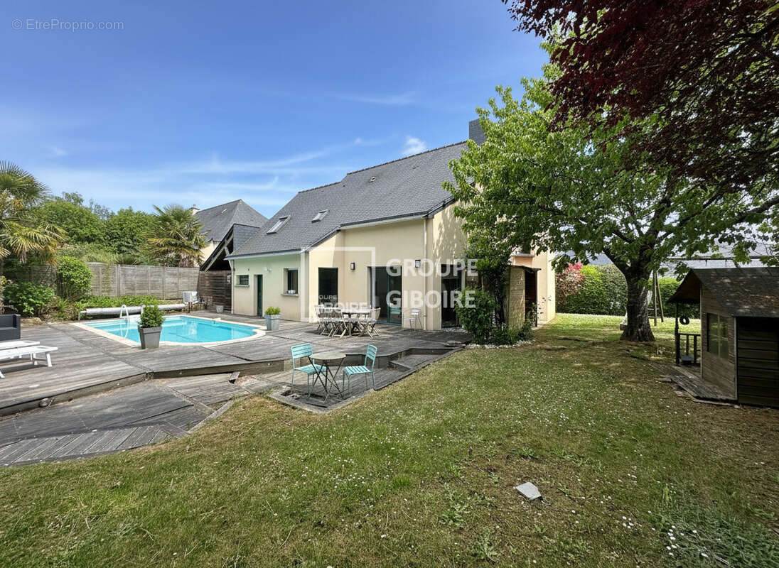 A vendre - Agence Giboire - Maison familiale d'environ 120 m2 - Golf de Cicé Blossac: quartier prisé pour son environnement priv - photo 2