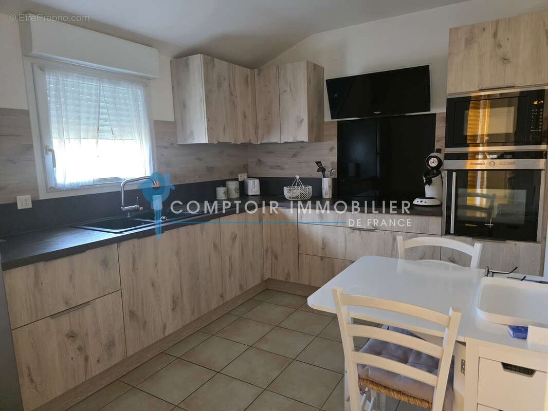 07 - RUOMS - LES SENORIALES T3 . 90m2 + 1 parking + 1 garage - photo 2