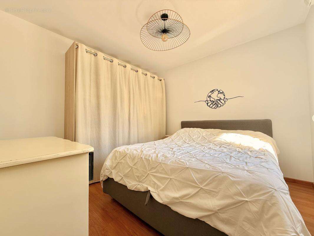 Appartement T3 avec jardin privatif et place de stationnement - photo 7