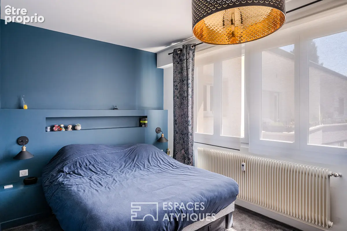 Appartement avec balcons suspendus au sommet d'un immeuble aux lignes modernistes - photo 6