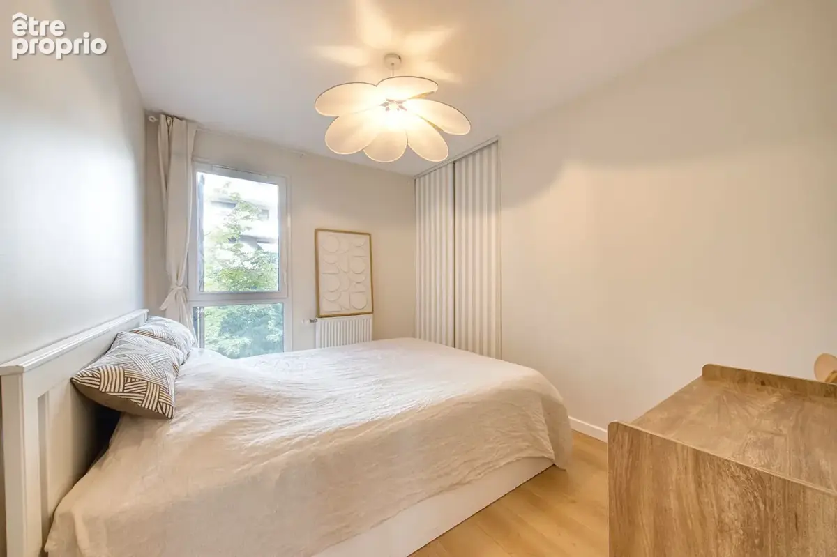 Magnifique T3 de 57 m²  Traversant Est-Ouest, calme et lumineux à Villeurbanne République - photo 7