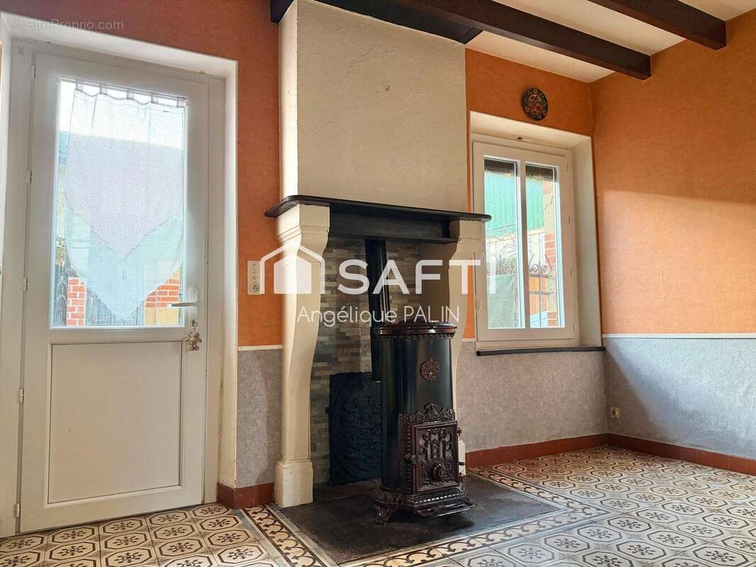 Photo 2 - Maison à LA NEUVILLE-AU-PONT