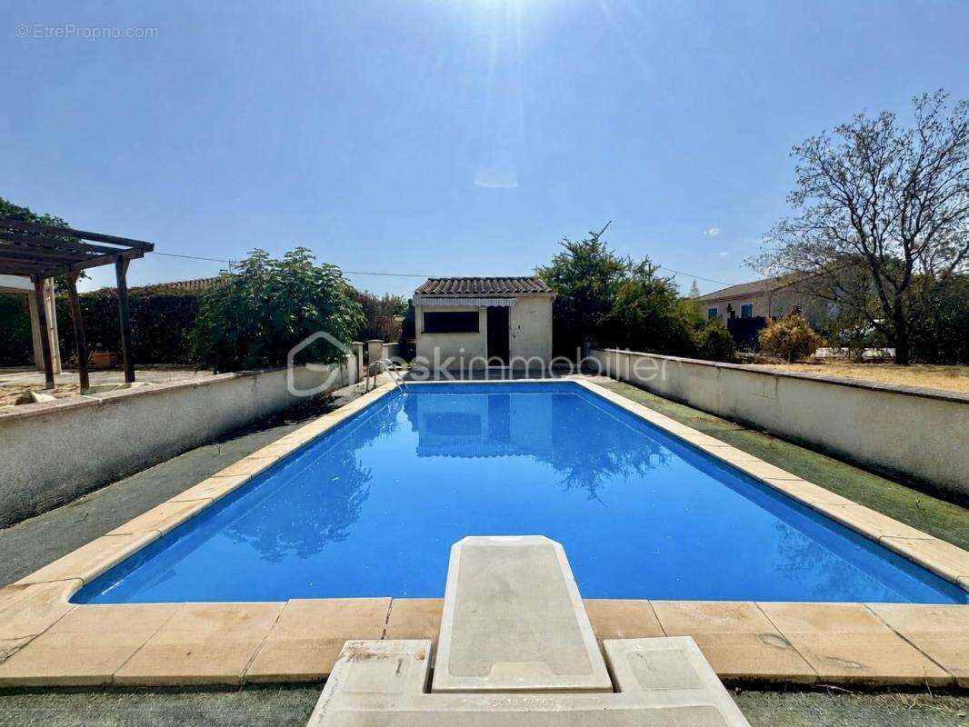 Plain-pied 3 chambres avec garage, piscine et grand terrain - photo 7