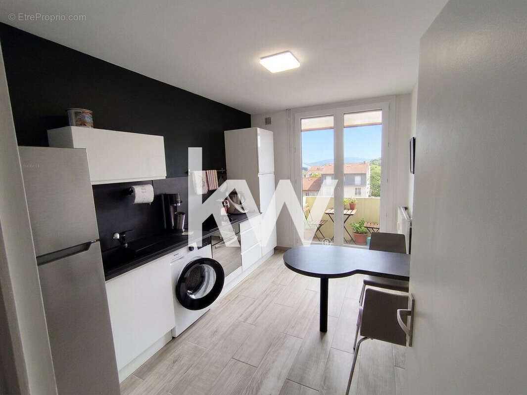 Appartement 49 m² à Saint-Etienne  - photo 4