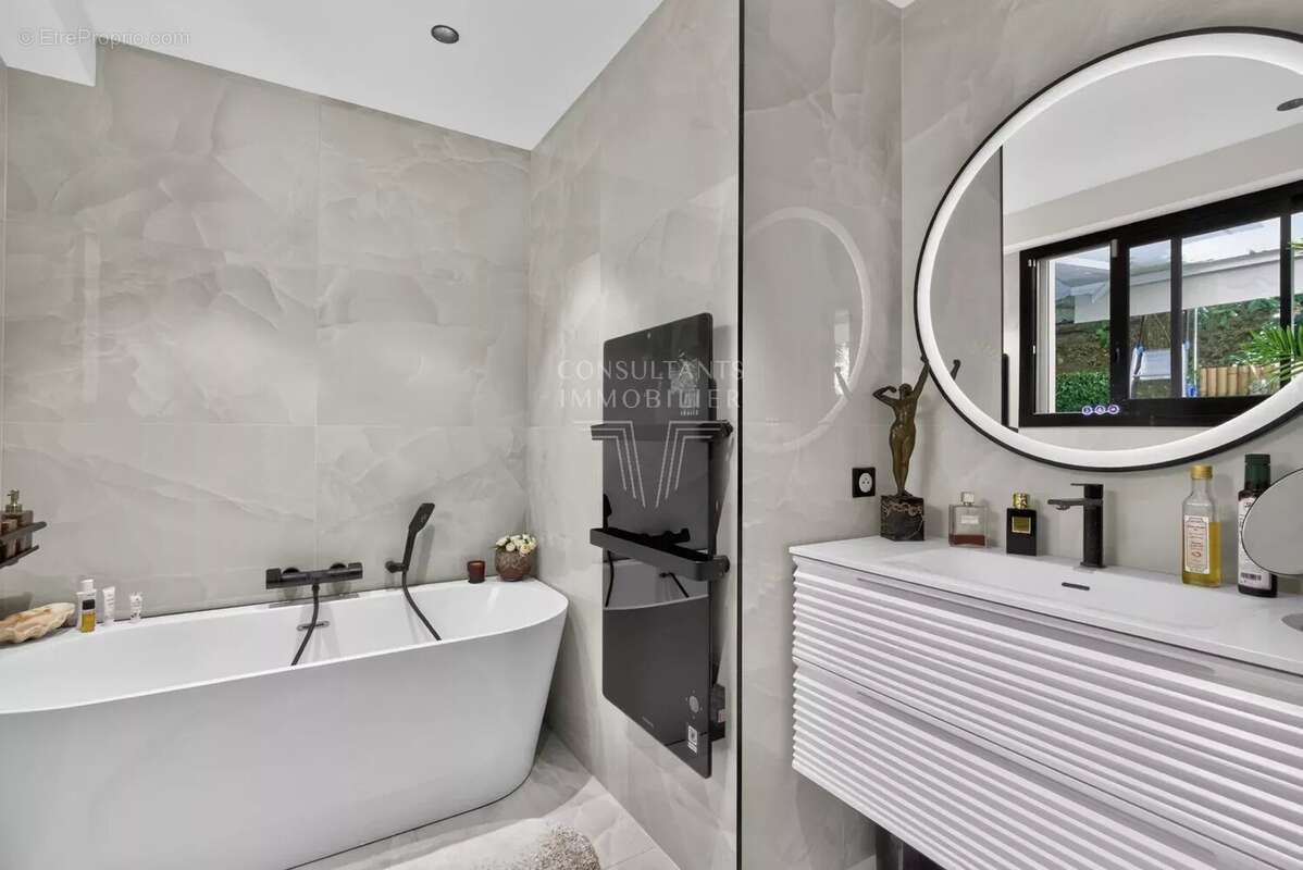 Appartement d'exception en rez-de-jardin. - photo 16